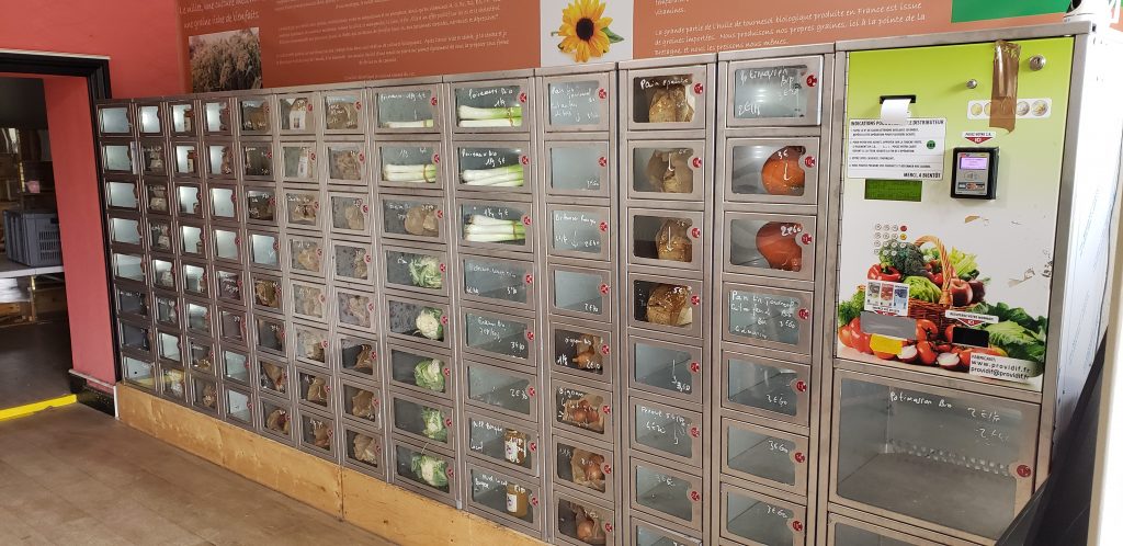 A full-wall automat vending machine in Benodet, France selling organic produce, bread and other food staples